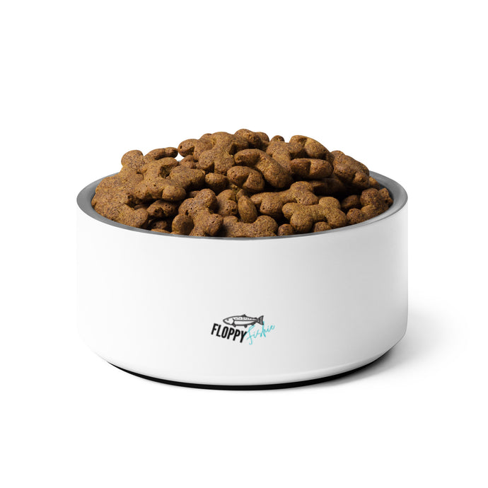 Dog food bowl filled with food.